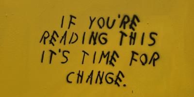 "If you're reading this it's time for change". Photo by hay s on Unsplash.
