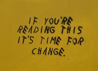 "If you're reading this it's time for change". Photo by hay s on Unsplash.
